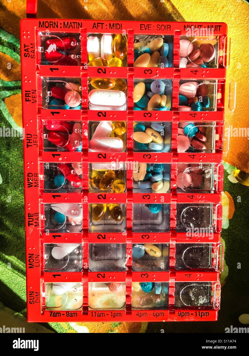Pills organizer - Smartphone Captured Stock Image