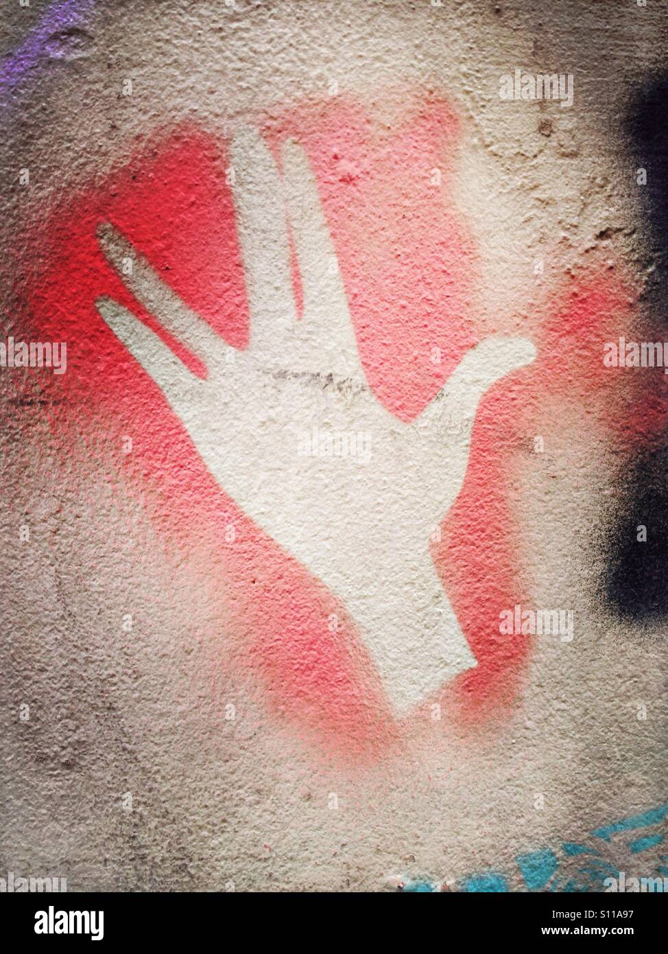 A stencil graffiti of a hand demonstrating the vulcan salute from the TV series Star Trek Stock Photo