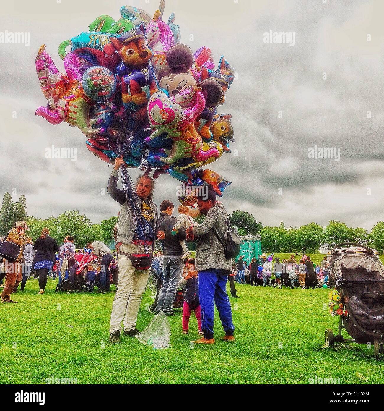 Balloon seller at a country fair Stock Photo Alamy
