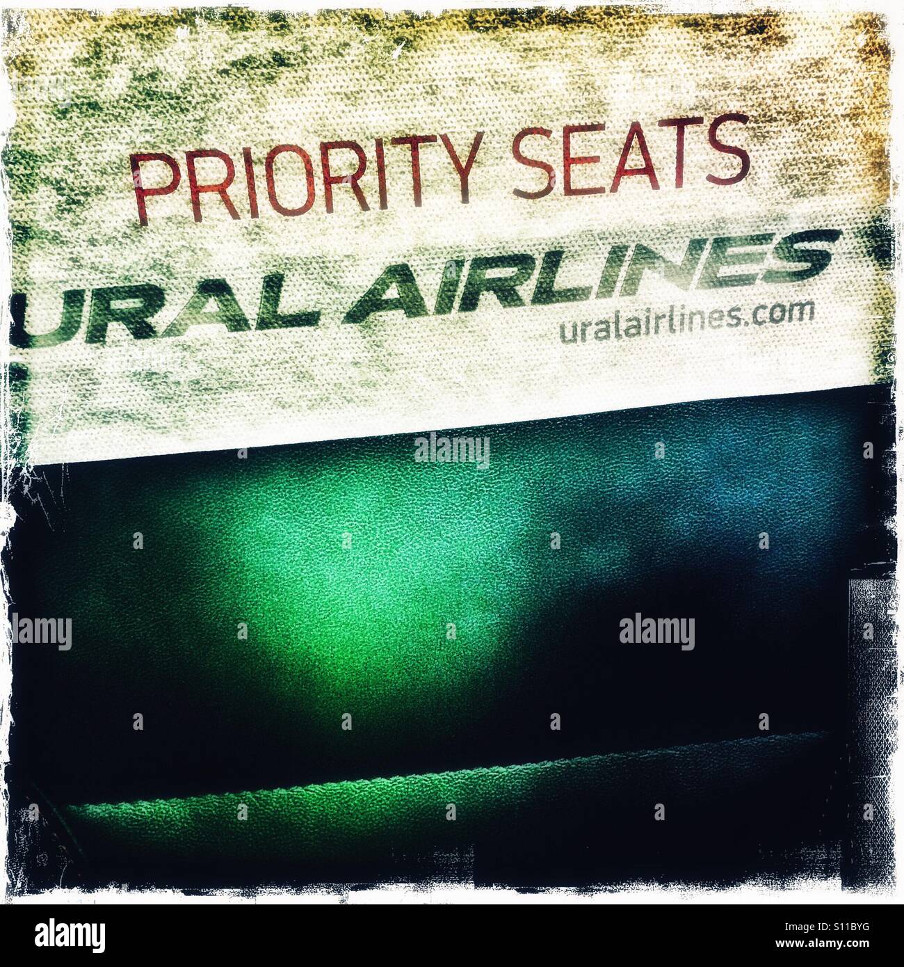 Priority seats sign, Ural Airlines, Russia - Smartphone Captured Stock Image