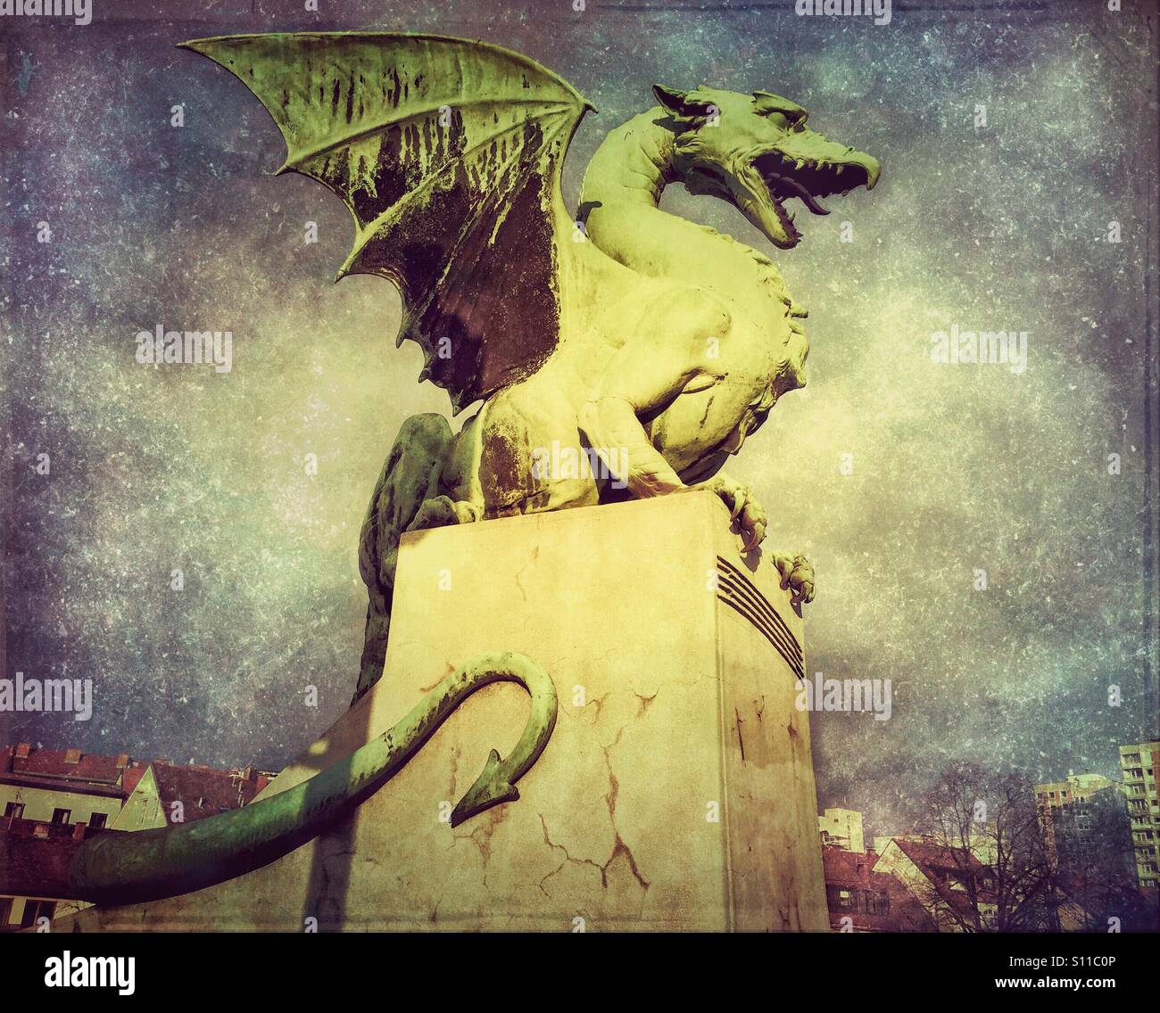 Dragon statue on Dragon bridge in Ljubljana, Slovenia - Smartphone Captured Stock Image