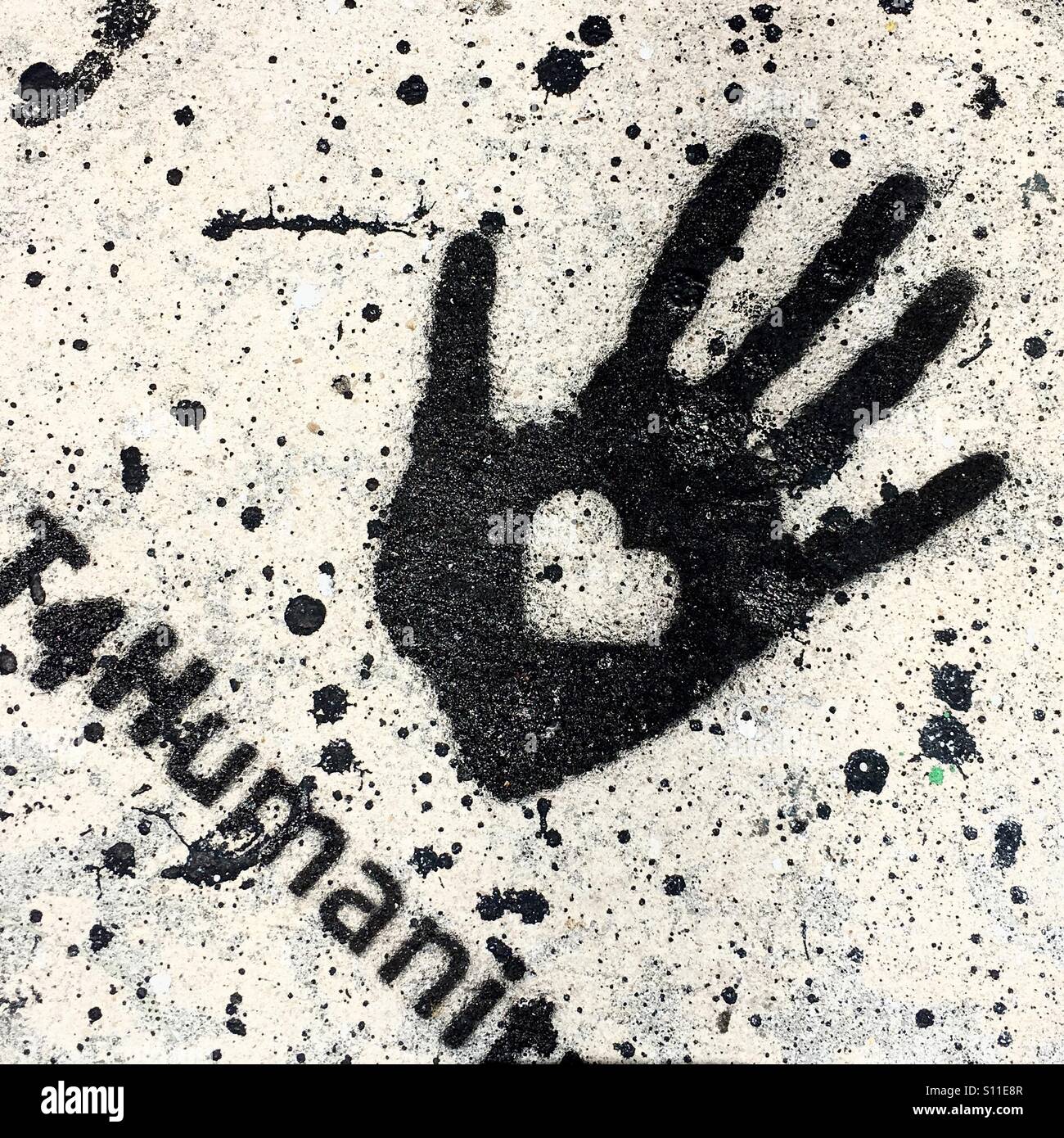 Sidewalk art for humanity at Wynwood art district Miami Stock Photo - Alamy