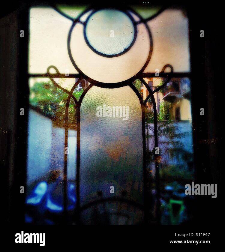 Art Deco window with intricate design - Smartphone Captured Stock Image