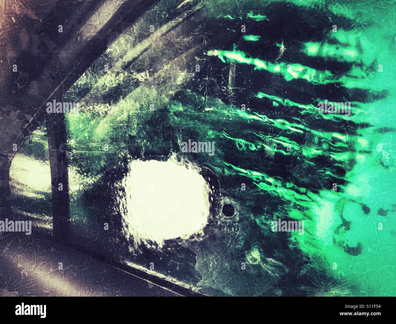 Car going through a car wash, seen from inside the car. - Smartphone Captured Stock Image