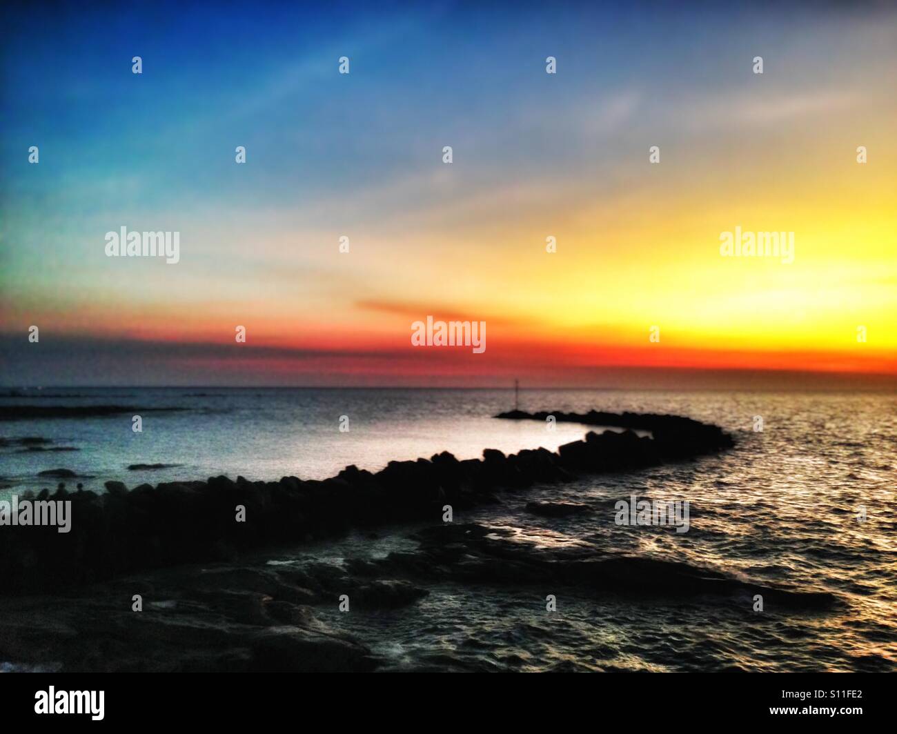 Sheltered boat ramp at Nightcliff in Darwin, Northern Territory, Australia. - Smartphone Captured Stock Image