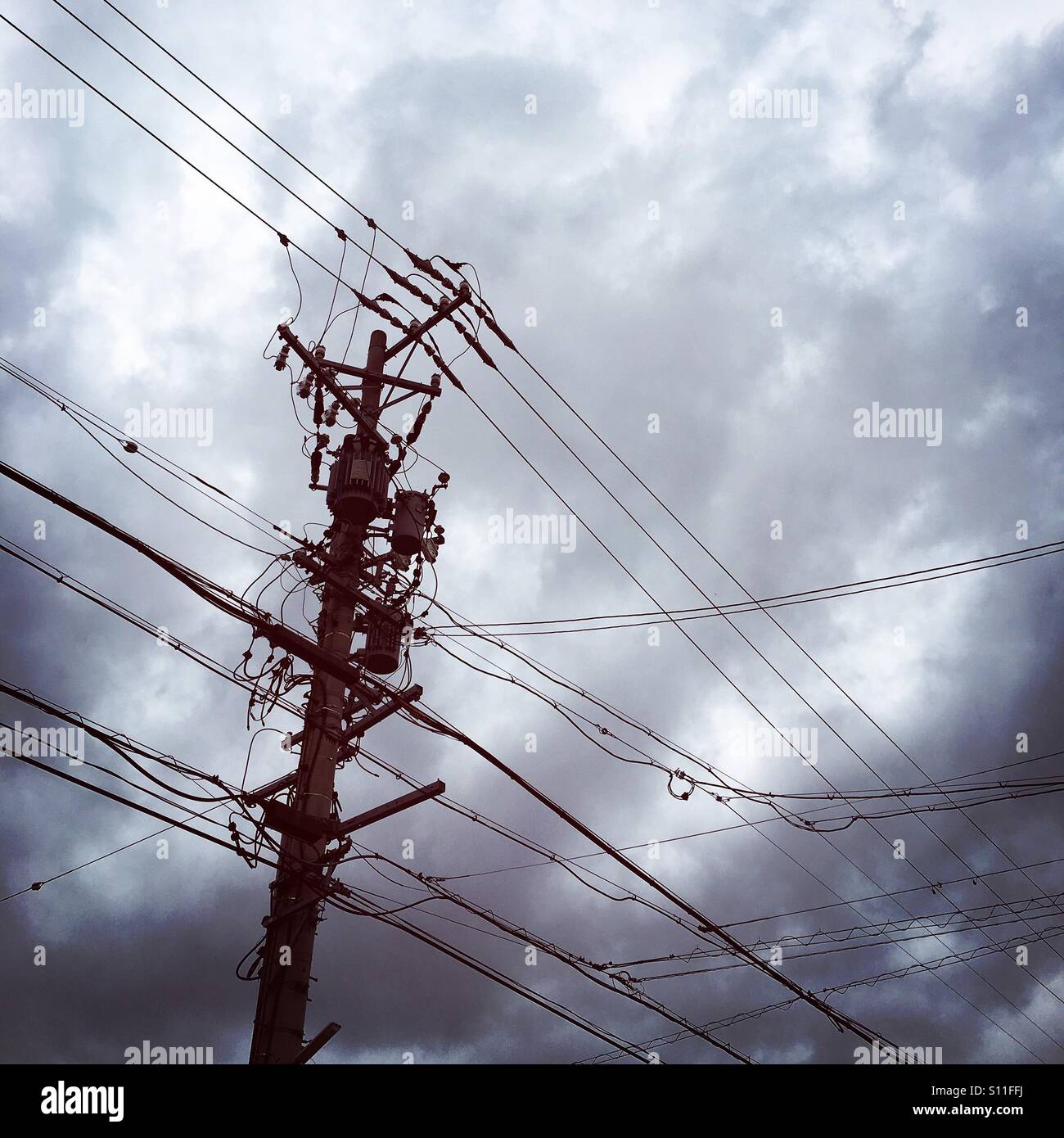 Power lines in Japan on a cloudy day. Square. Stock Photo