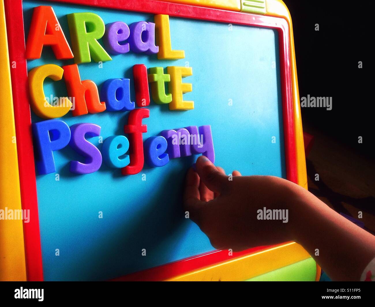 A child's spelling. - Smartphone Captured Stock Image