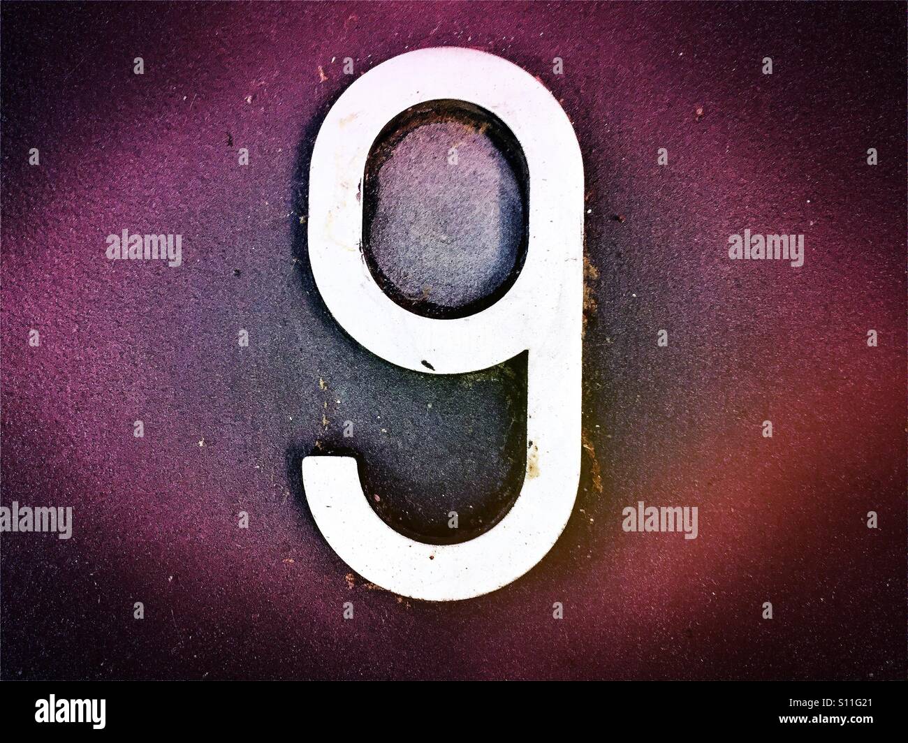 Number 9 in metal lettering - Smartphone Captured Stock Image