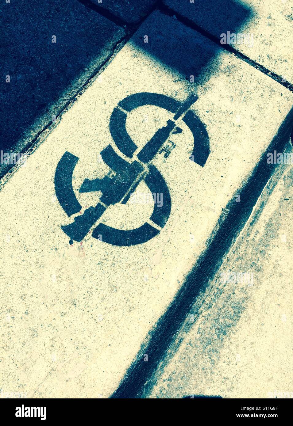 Guns and money - Smartphone Captured Stock Image