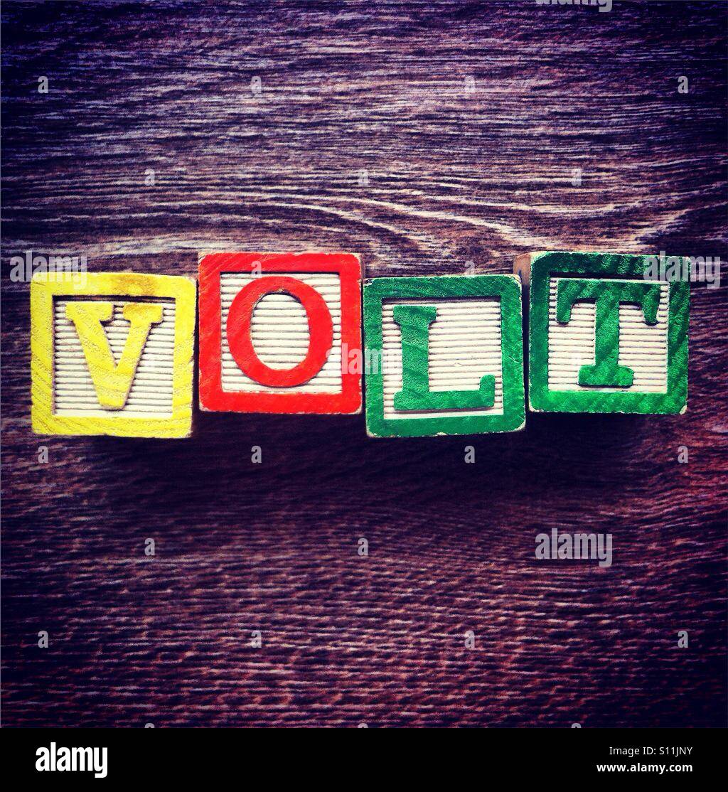 Word VOLT done with Alphabet wood blocks letters - Smartphone Captured Stock Image