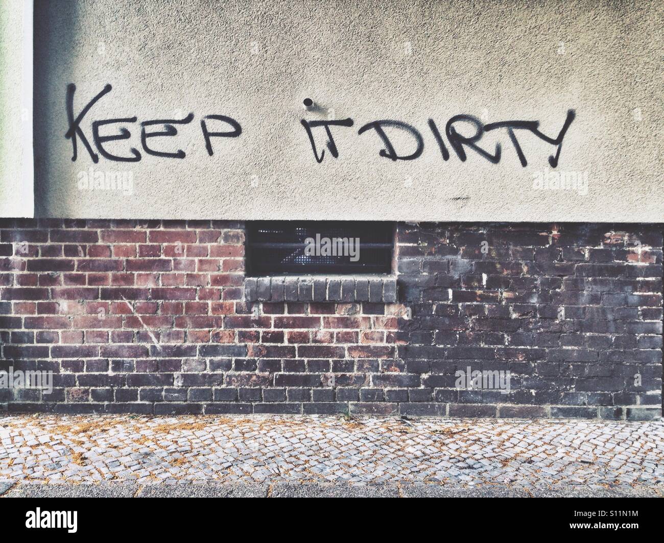 Keep it dirty graffiti in Berlin, Neukoelln, Germany Stock Photo