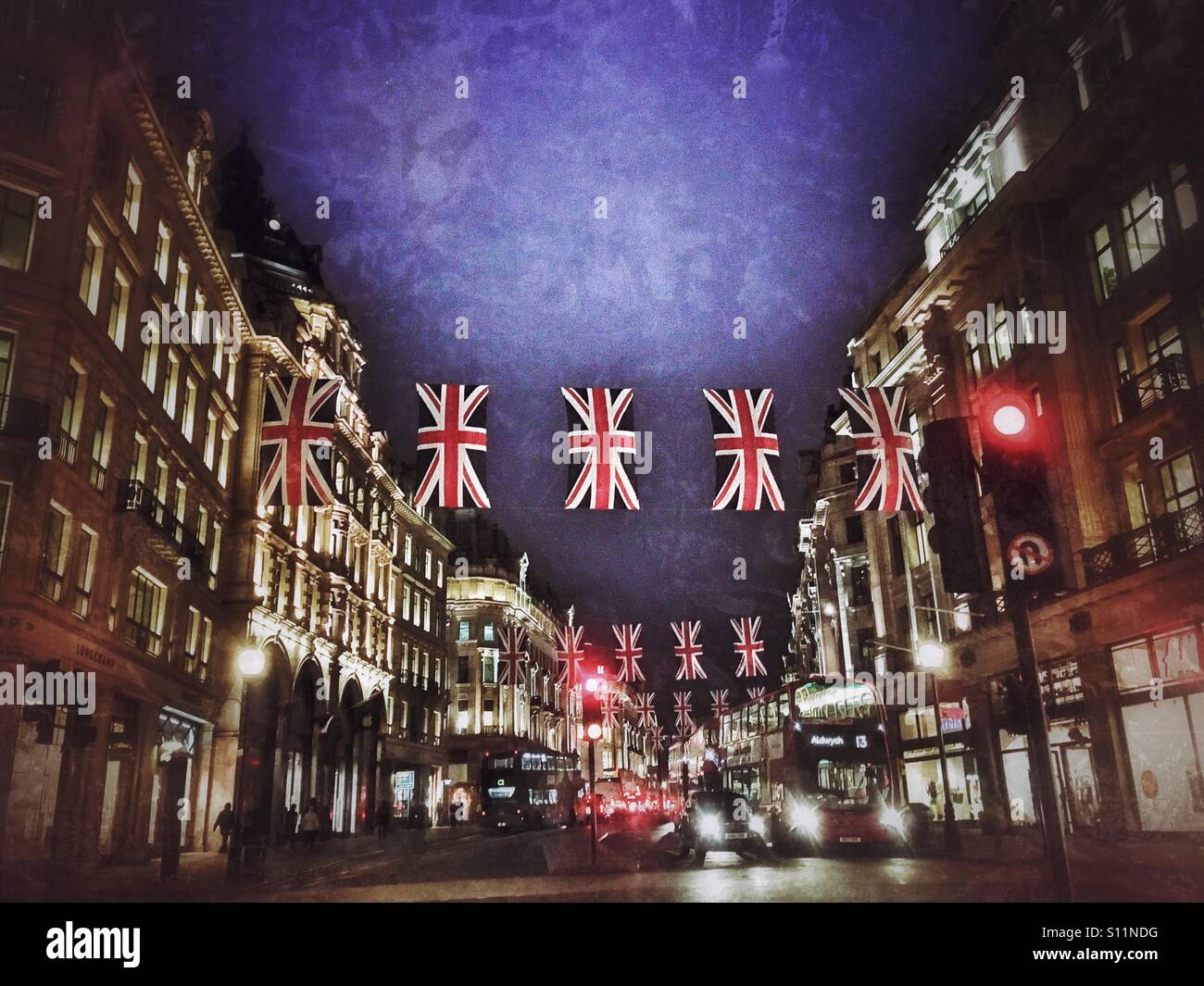 Union Jacks hanging over Regent Street in London Stock Photo