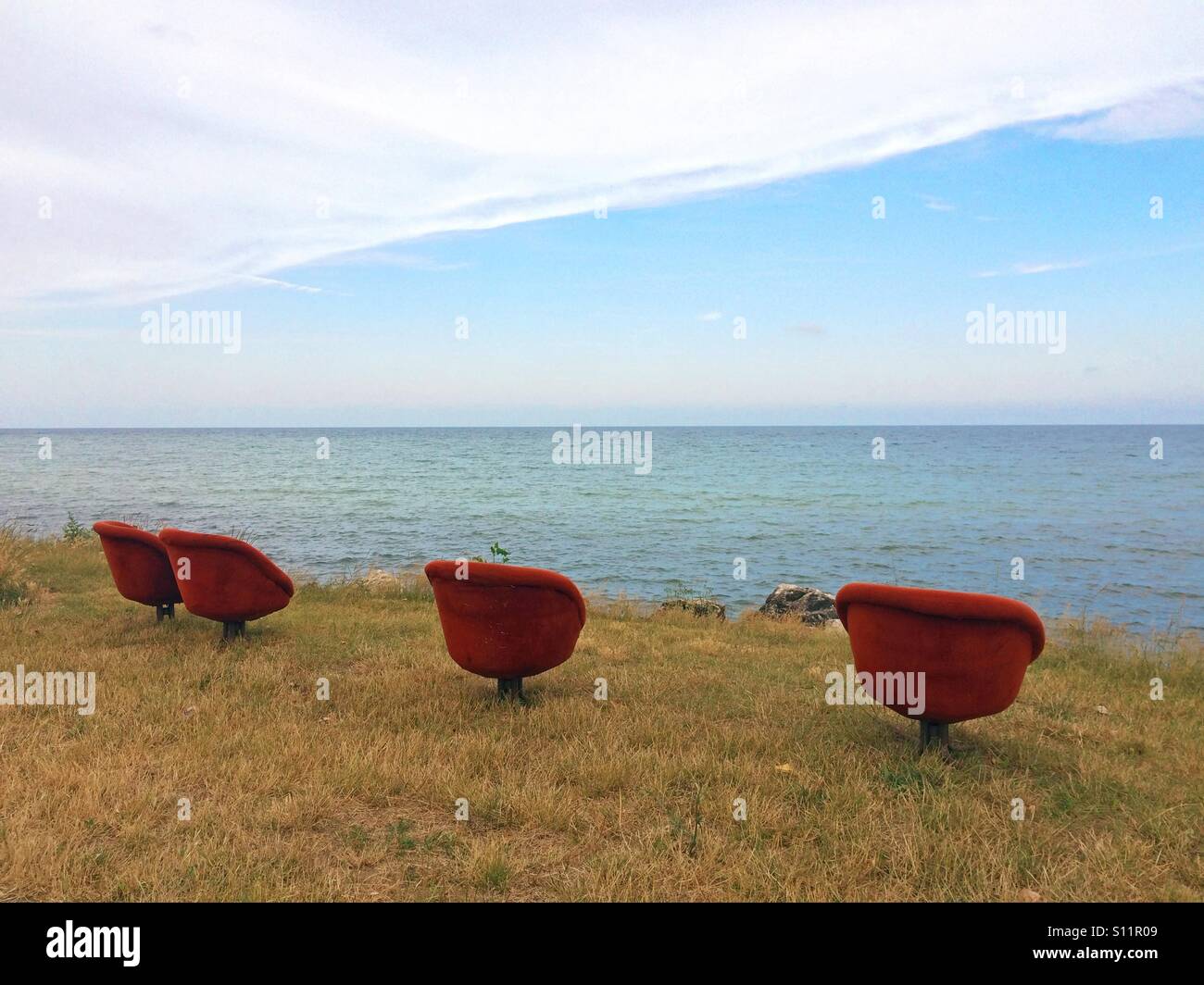 Retro armchairs by the sea Stock Photo