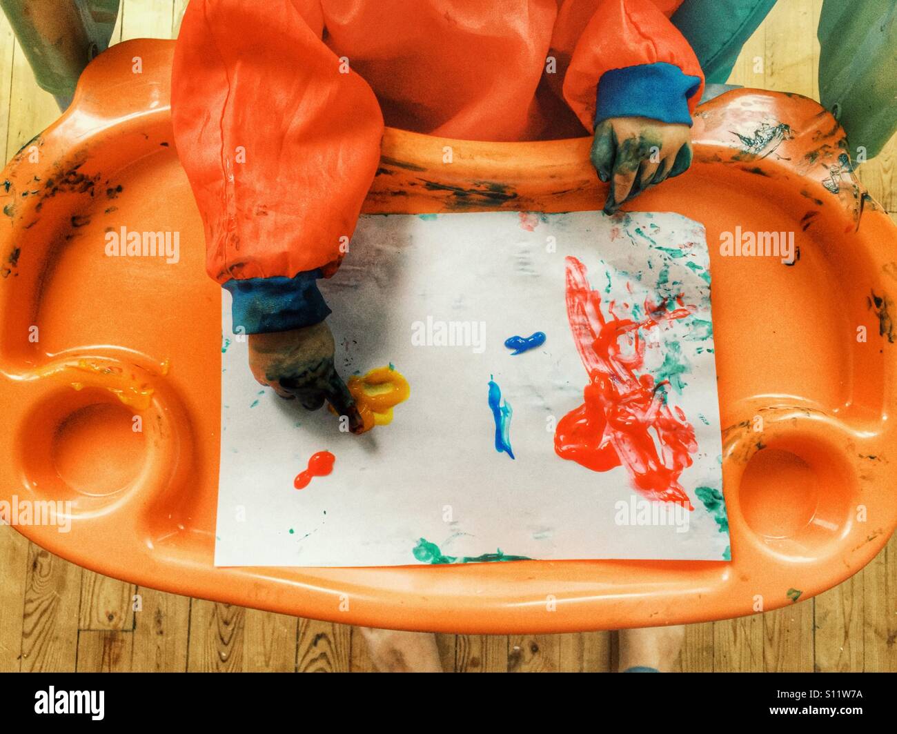 Toddler painting - Smartphone Captured Stock Image