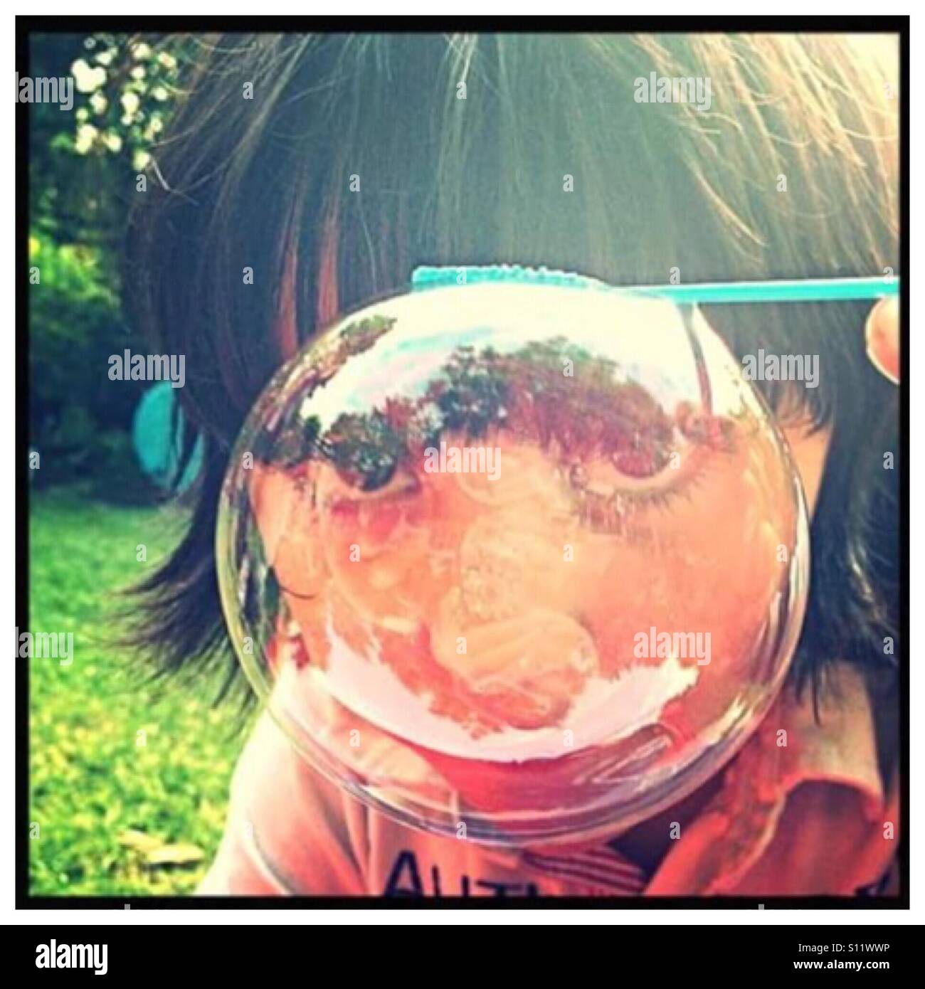 Boy in a bubble Stock Photo Alamy