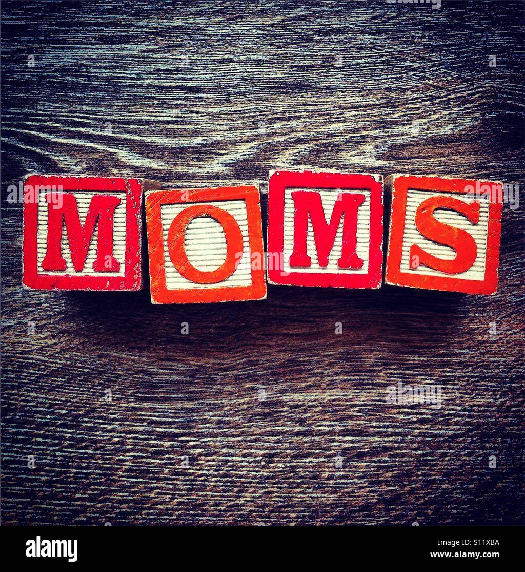 MOMS word done with wood blocks letters Stock Photo