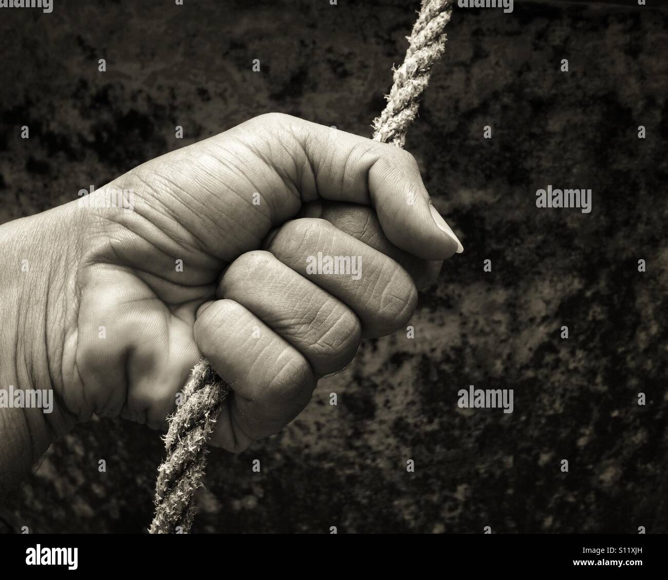 Finger pulling hires stock photography and images Alamy