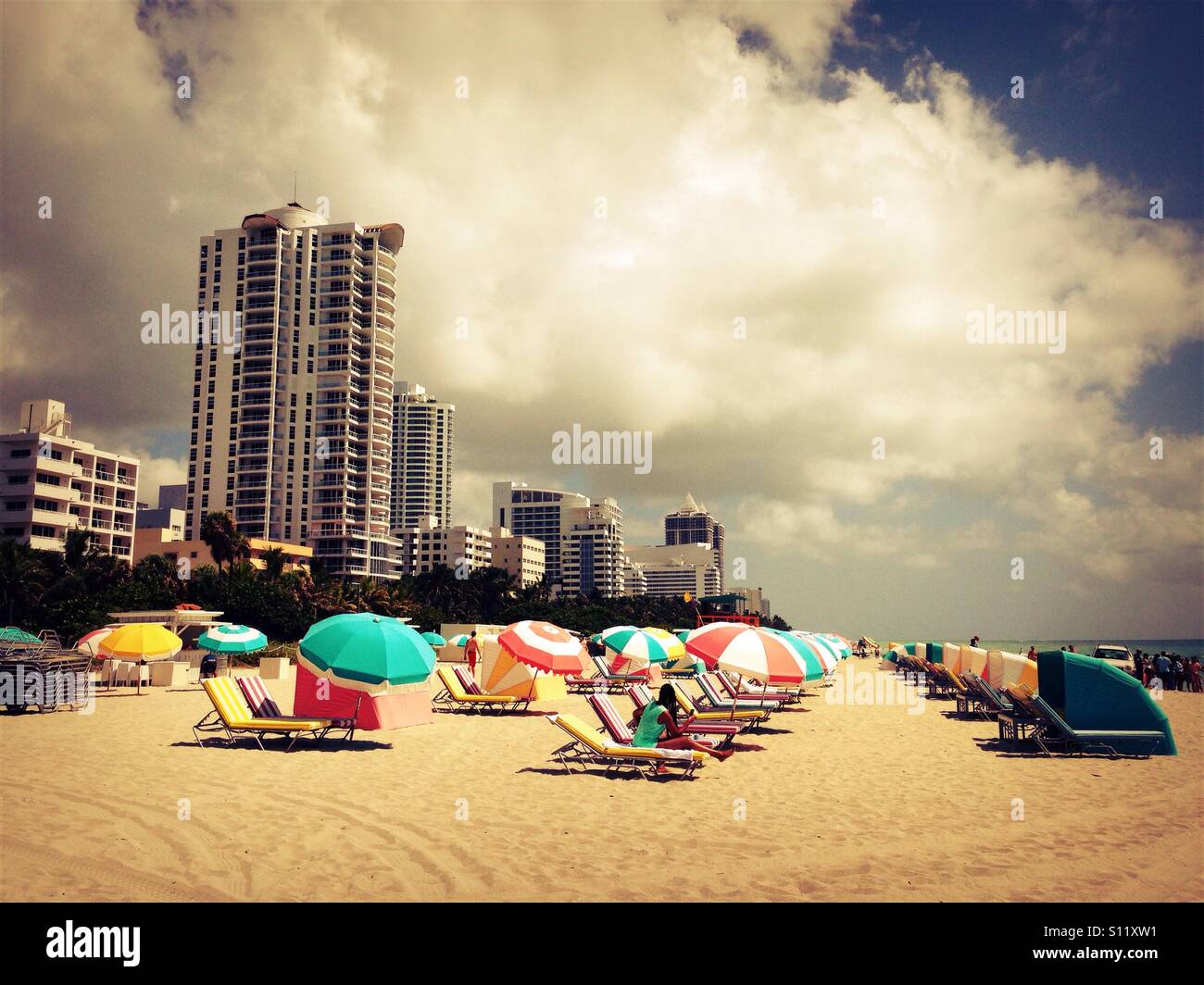 Candy coloured umbrellas on South Beach, Miami Stock Photo Alamy