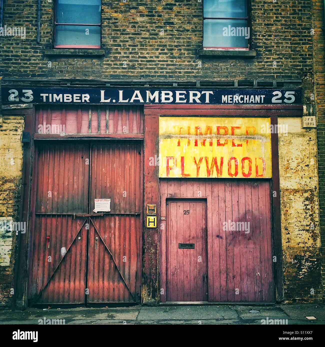 An old timber merchants in East London Stock Photo Alamy