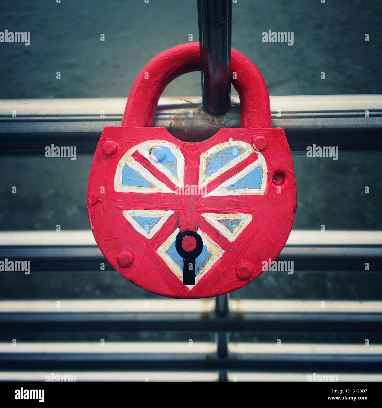 Union Jack Love lock padlock on a London Bridge. - Smartphone Captured Stock Image