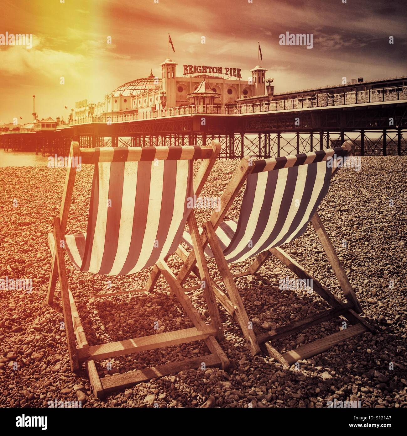 Deckchairs on brighton beach Stock Photo