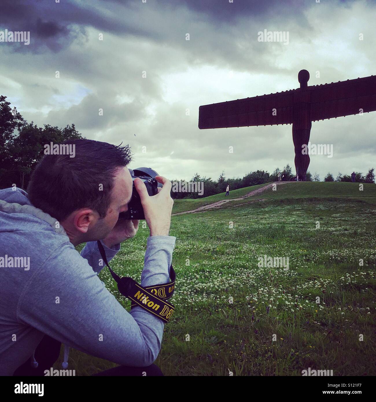 Photographer snapping the Angel of the North Stock Photo