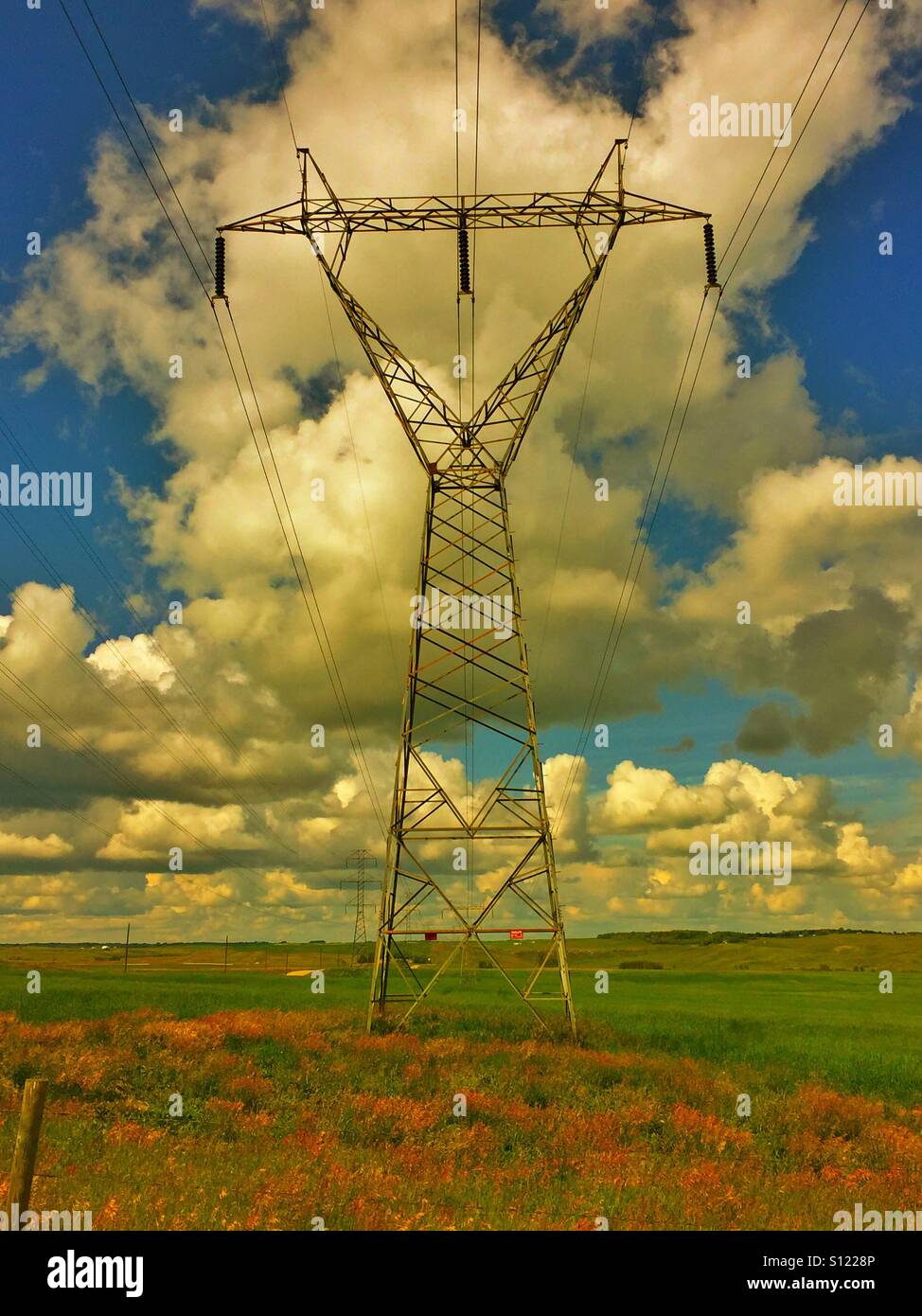 Electrical Transmission line structure and dramatic sky - Smartphone Captured Stock Image