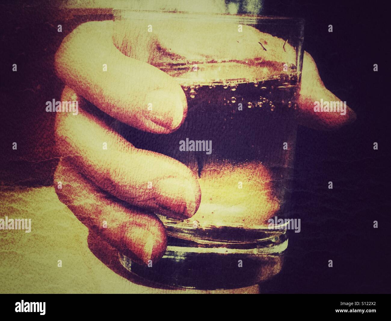 Holding a glass of cava. - Smartphone Captured Stock Image