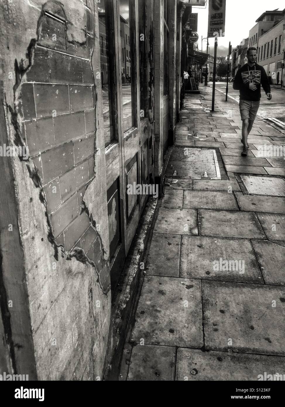 Wall, bricks, pavement. Textures. Camden Town. London, England Stock