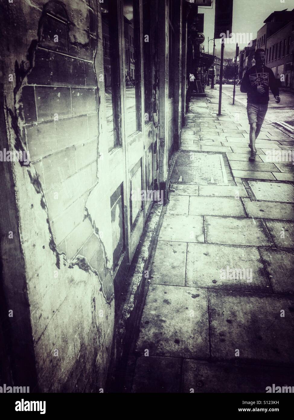 Wall, bricks, pavement. Textures. Camden Town. London, England Stock