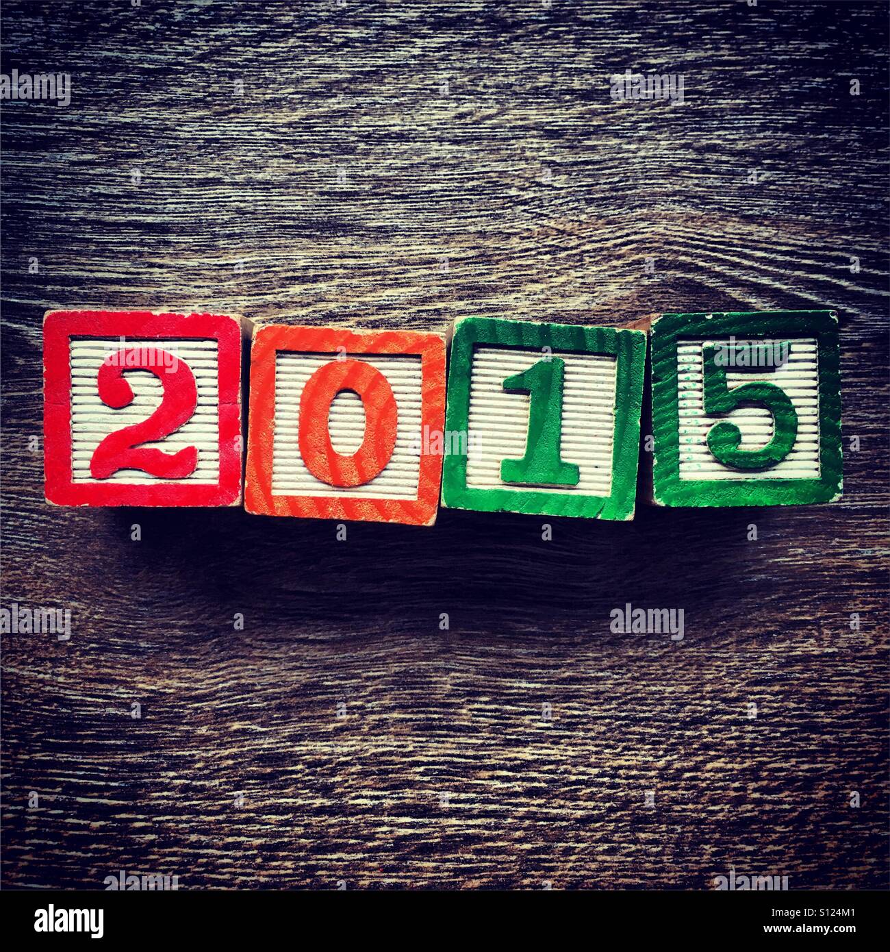 Year 2015 written with wood block number toys - Smartphone Captured Stock Image
