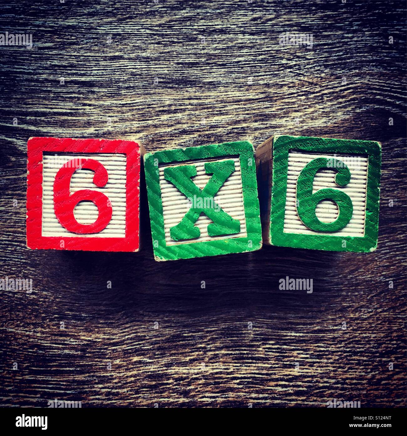 6x6 written with wood block number toys Stock Photo