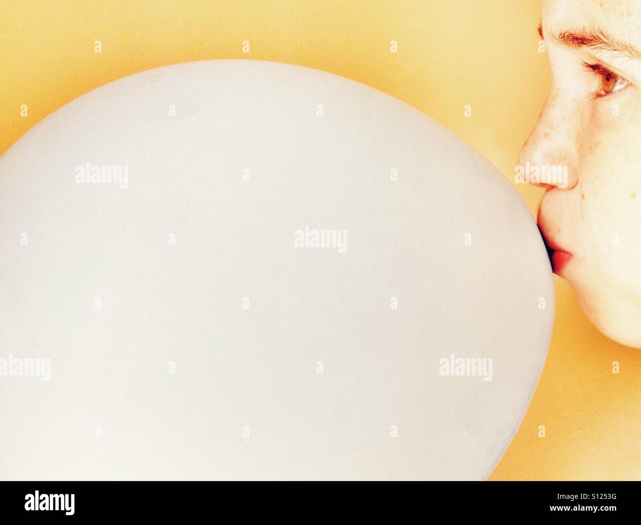 Girl blowing bubblegum Stock Photo