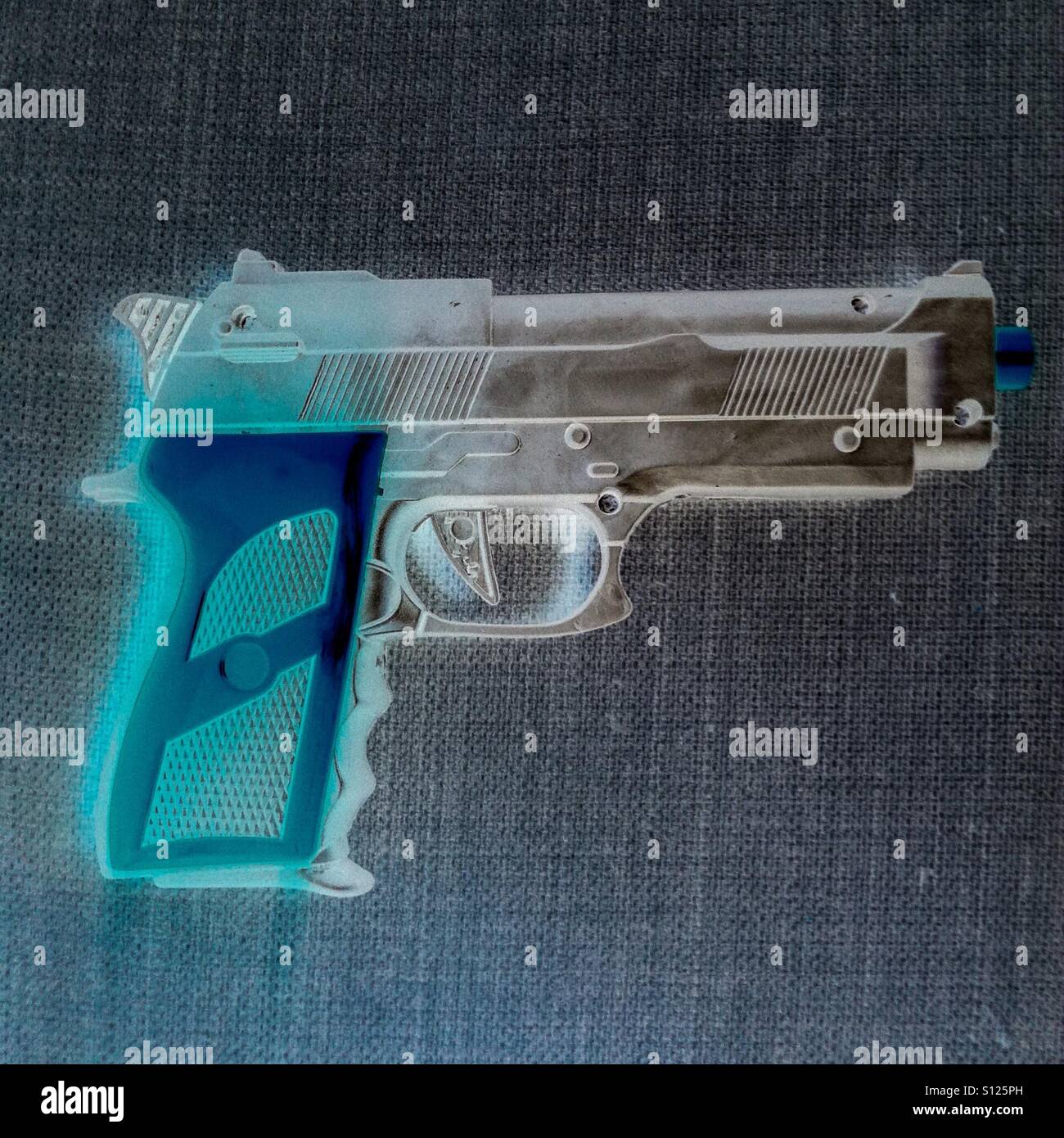 Toy gun invert mode - Smartphone Captured Stock Image