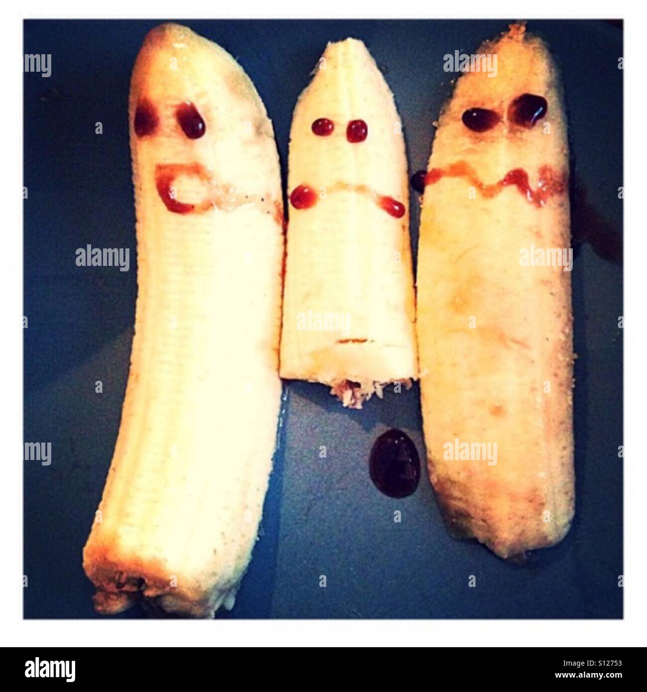 Faces on bananas Stock Photo Alamy