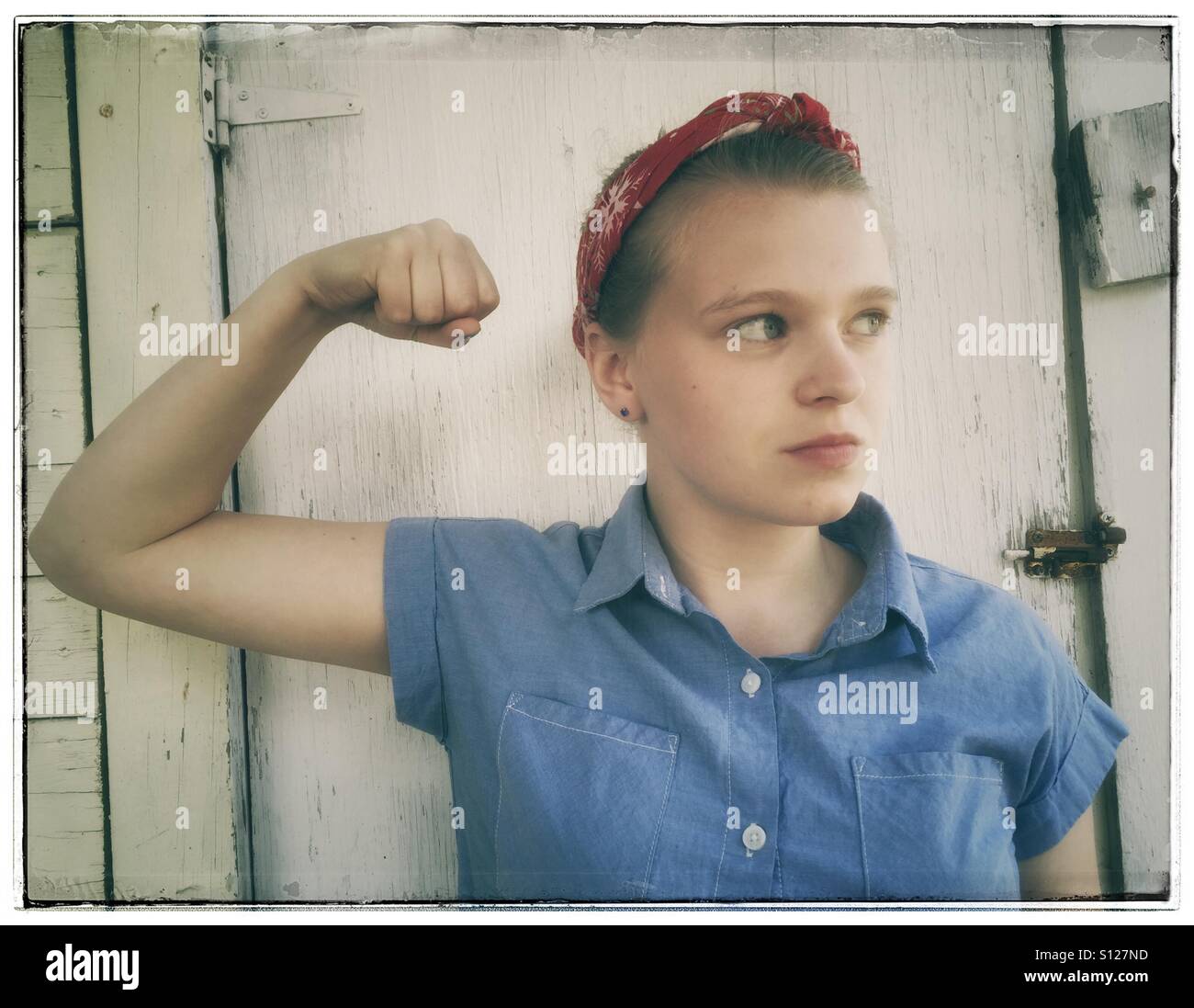 Young Rosie the riveter. Stock Photo