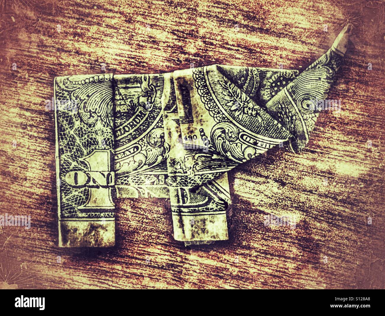 Origami elephant, made using a US $ bill - Smartphone Captured Stock Image