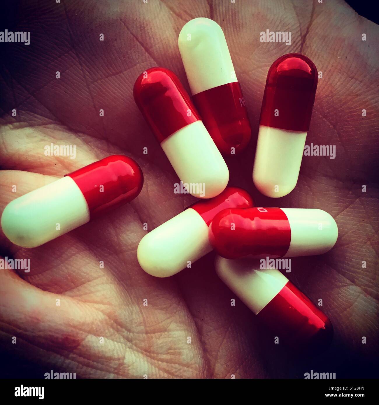 Medicine Pills in hand - Smartphone Captured Stock Image