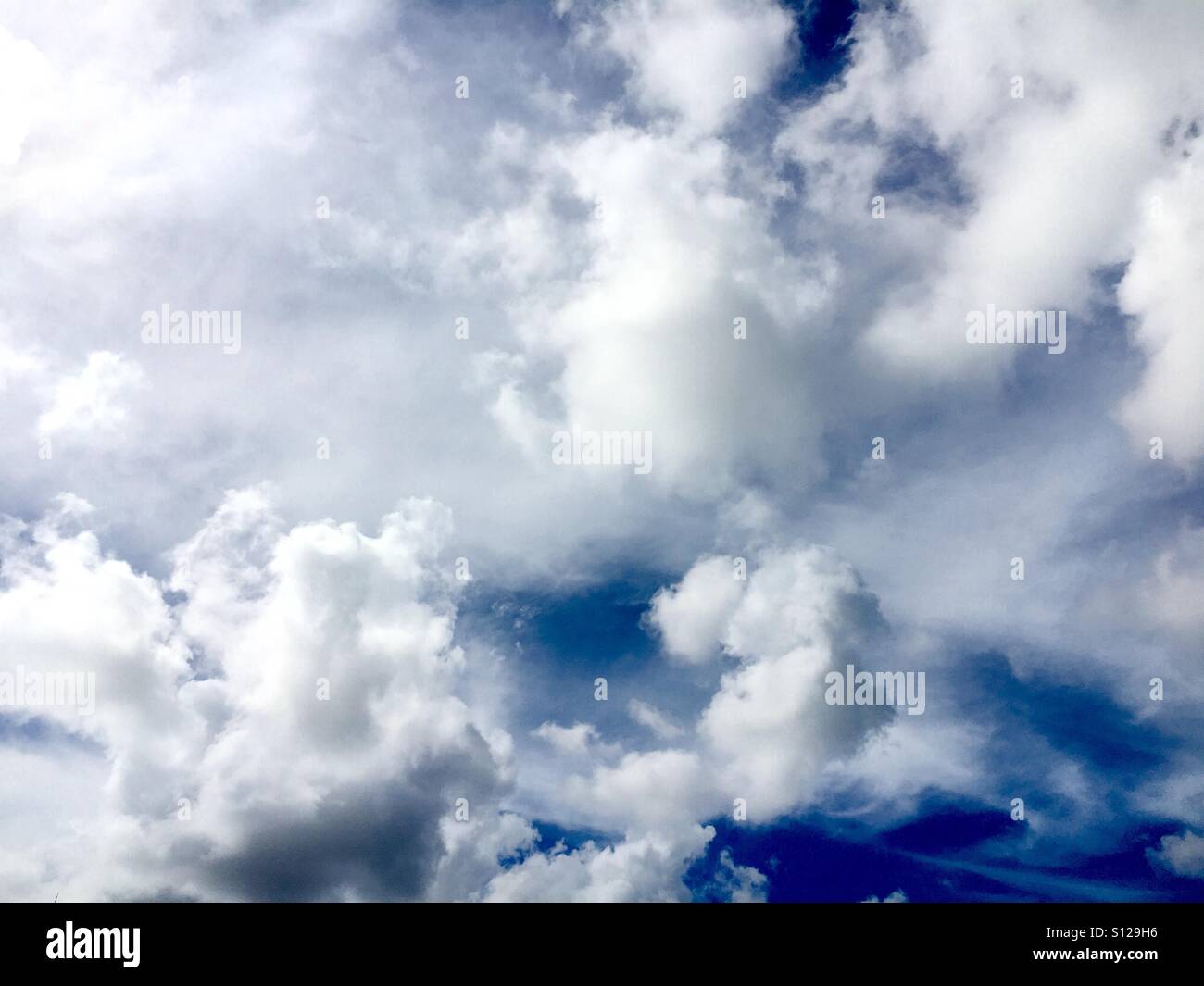 White puffy clouds - Smartphone Captured Stock Image