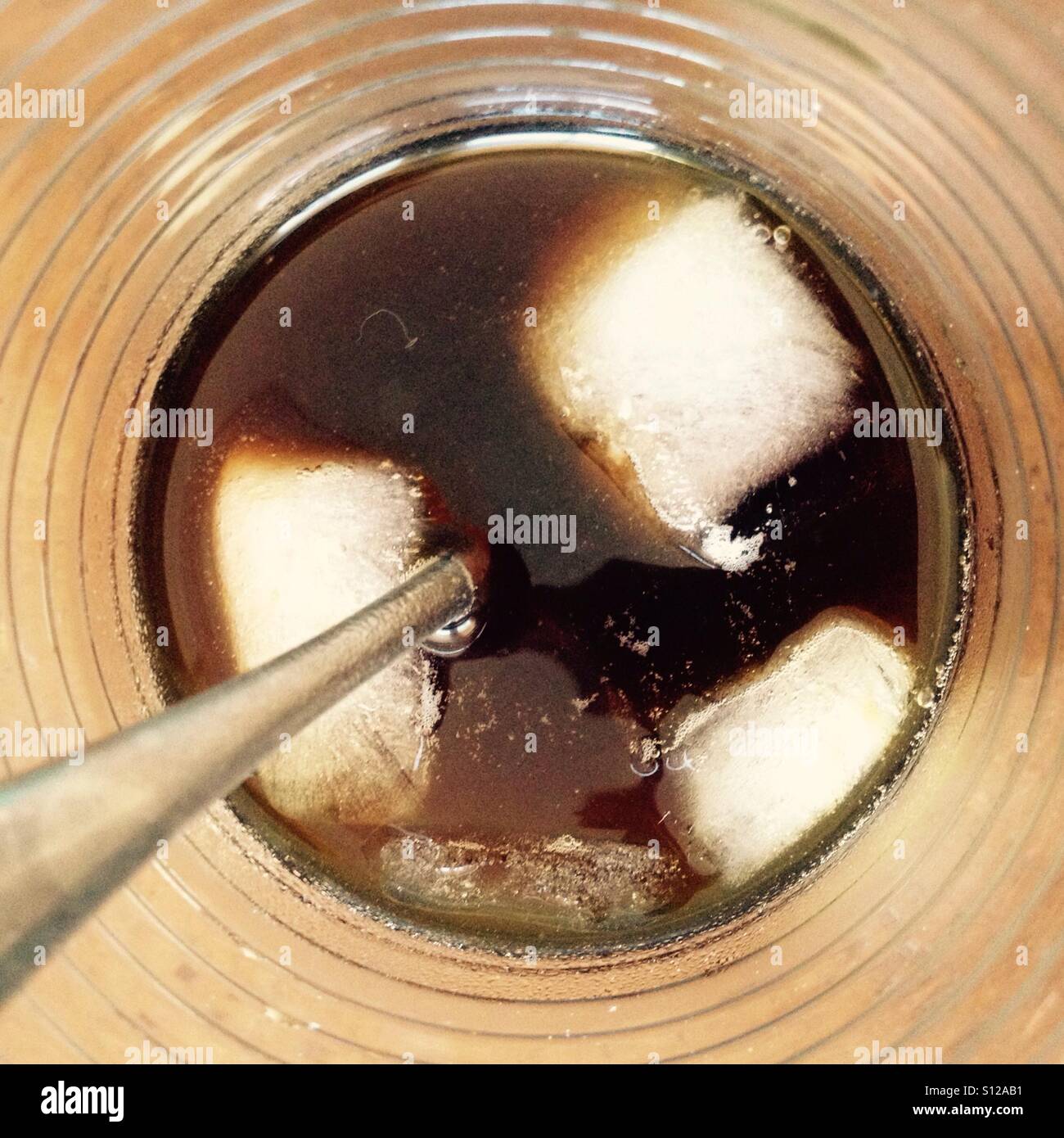 Ice coffee at last. It must be summer. - Smartphone Captured Stock Image