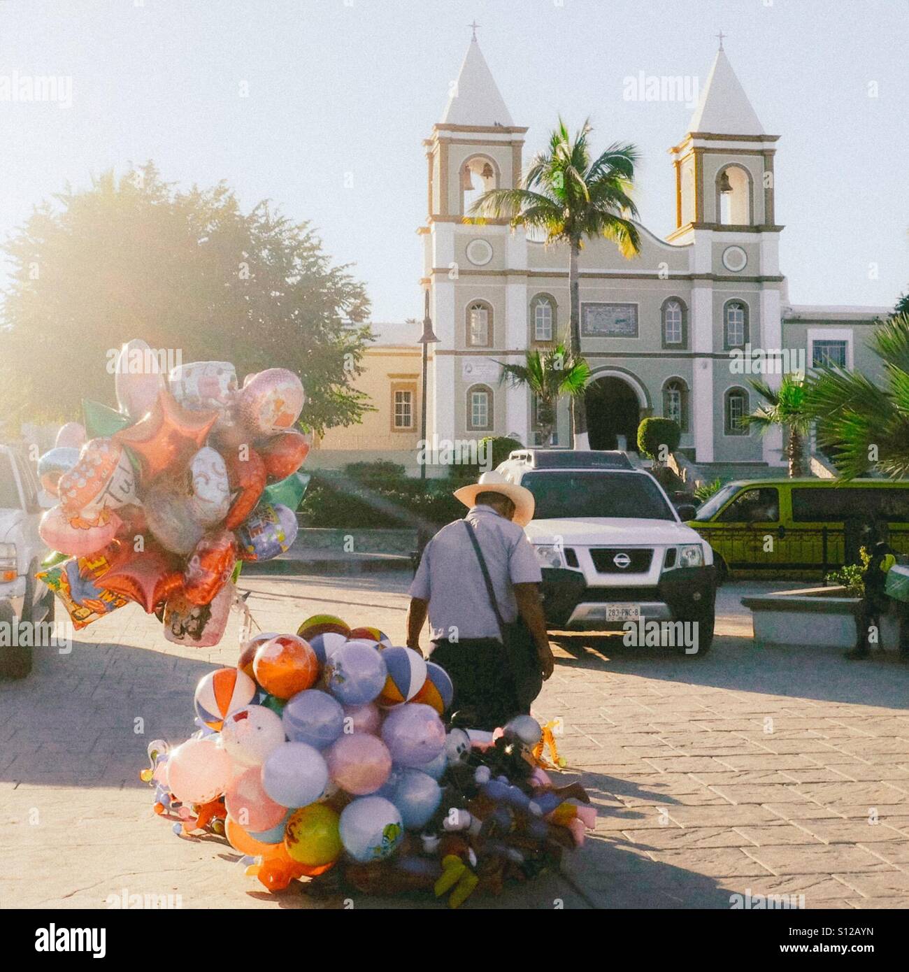Balloon seller in the plaza in San Jose del Cabo, Mexico Stock Photo
