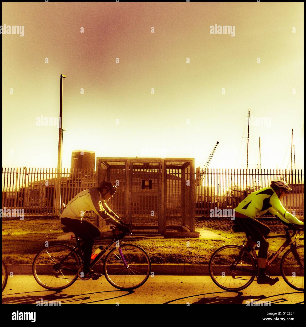 Cyclists by the side of the road. - Smartphone Captured Stock Image