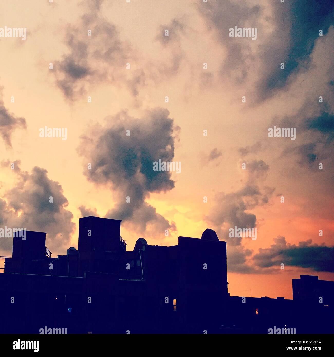 Sunset in the midst of a summer thunderstorm Stock Photo