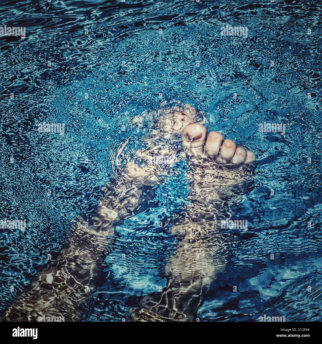 Summer fun. POV. Relaxing in swimming pool. - Smartphone Captured Stock Image