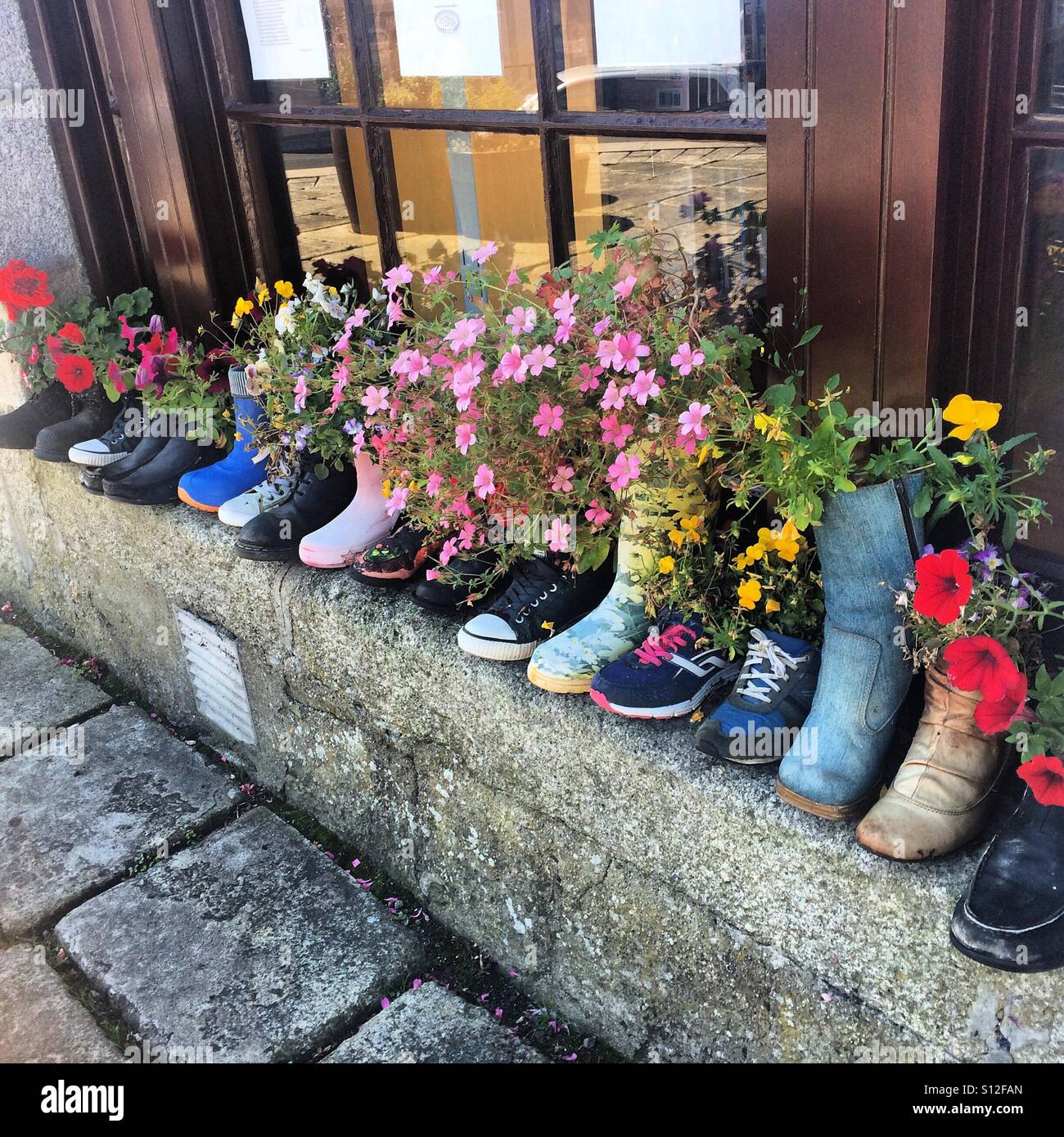 Flower pot wellies in honor of Easter Rising 100th Anniversery Stock Photo  - Alamy