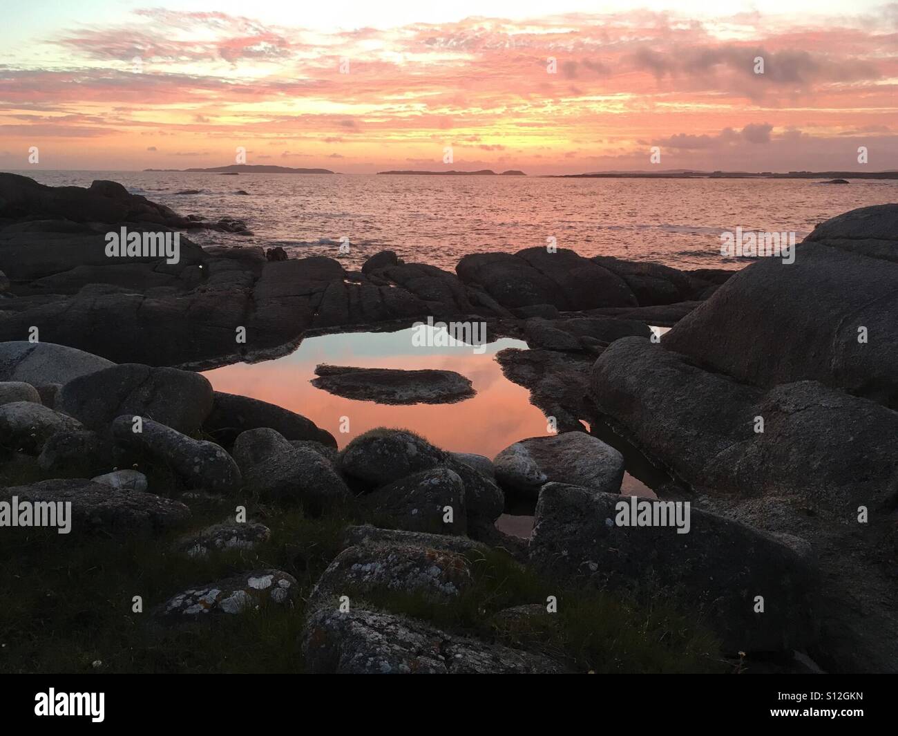 Beautiful sunset on Omey Island, Connemara, Ireland Stock Photo