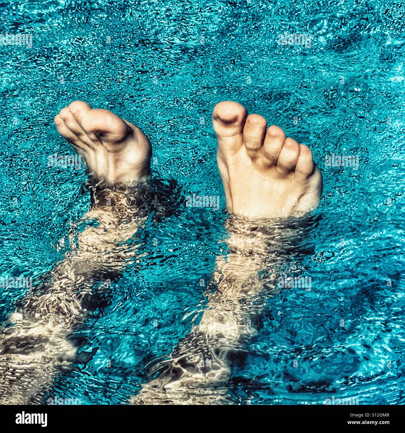 Summer fun. Relaxing in a swimming pool - Smartphone Captured Stock Image
