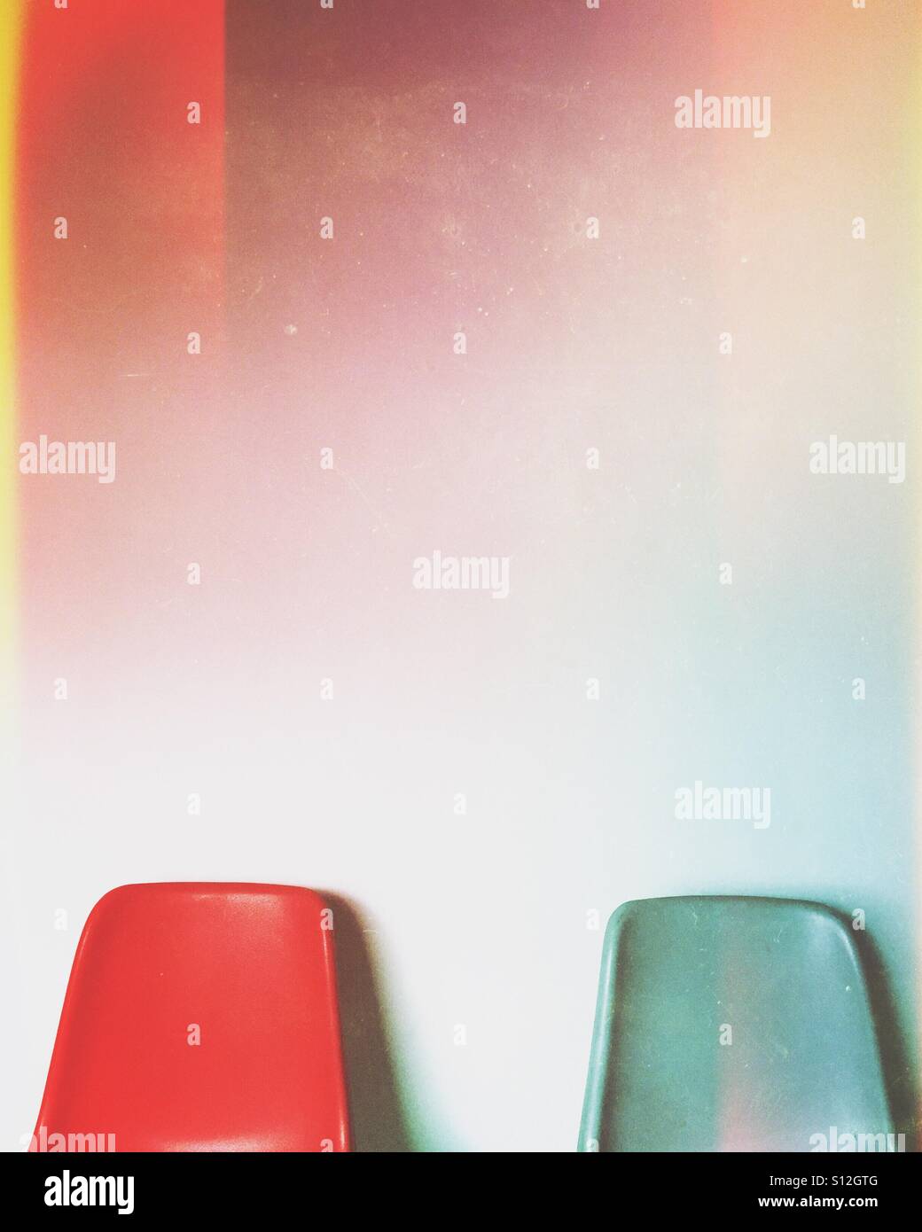 Single red chair in waiting room - Smartphone Captured Stock Image