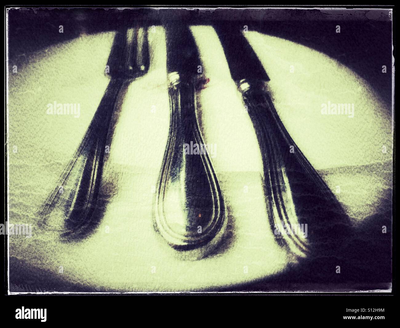 Knives and cake fork for afternoon tea - Smartphone Captured Stock Image