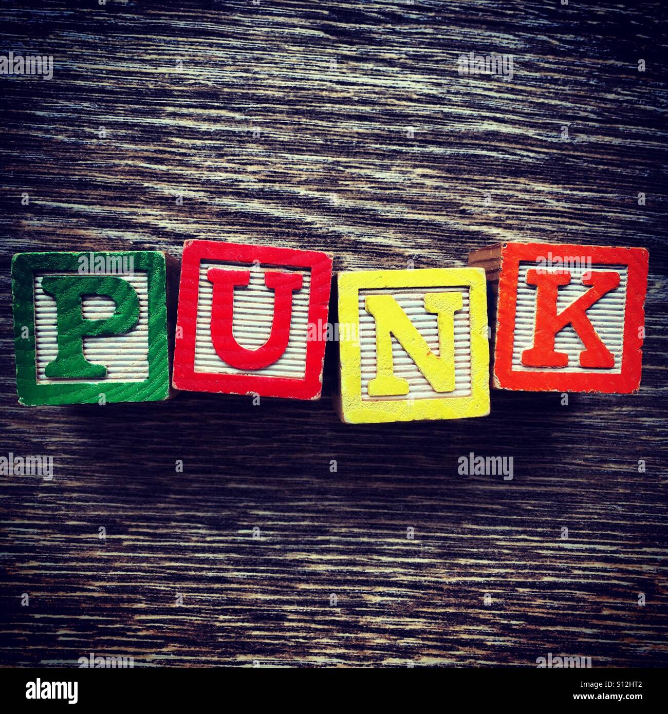 PUNK word written with wood block letter toys - Smartphone Captured Stock Image